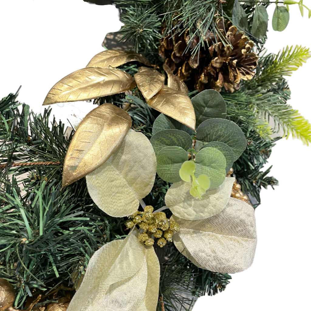 Artificial wreath with cream poinsettias, gold leaves, berries & pinecone